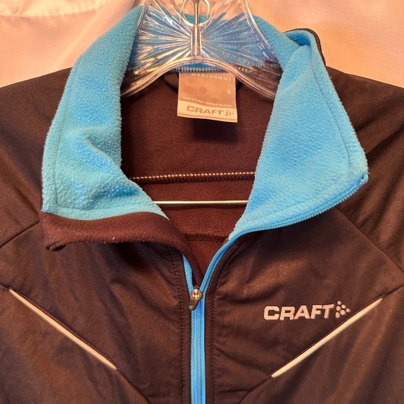 Craft Intensity Softshell Windbreaker Jacket Size Small Black Blue Trim RN 99431 - Picture 2 of 11